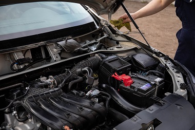 New car battery installed in car